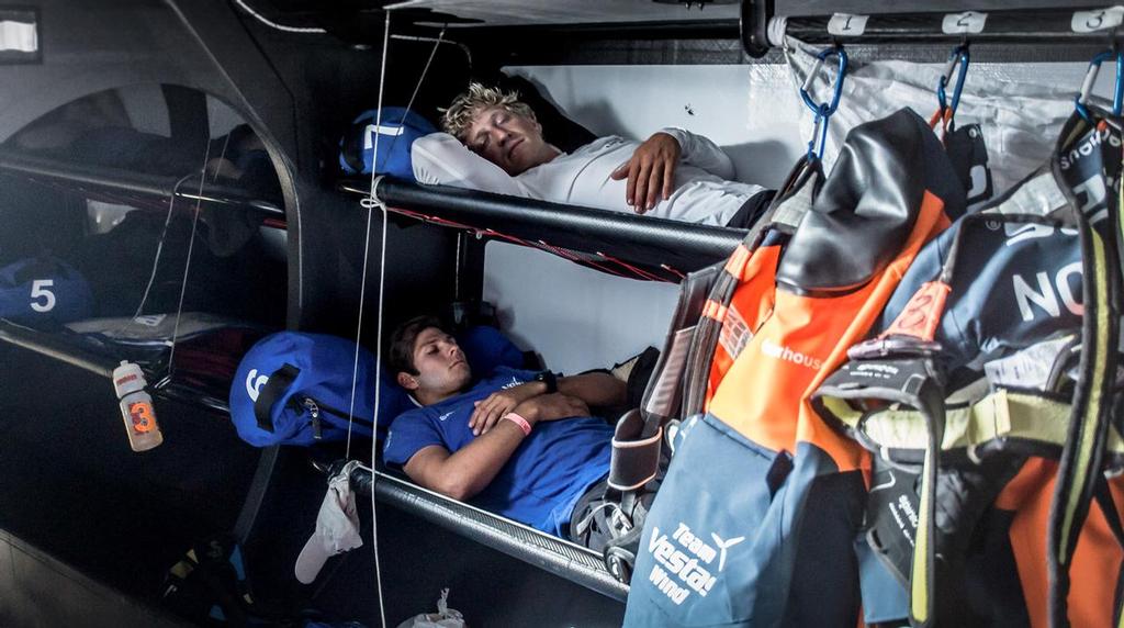 October 11, 2014. Tom Johnson (lower) and Peter Popp Wibroe (upper) catch some sleep on the first evening at sea on the Volvo Ocean Race.  Leg 1. © Brian Carlin - Team Vestas Wind